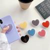 Airbag Heart-Shaped Retractable Phone Holder - Creative Solid Color Gift with Logo