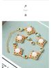 Gold-Plated Four-Leaf Clover Jade Bracelet: Chinese Style Handicraft