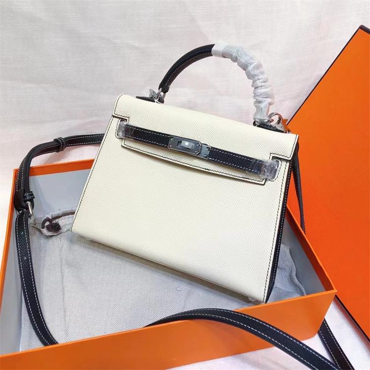 

Нова чорно-біла панда колірна схема сумка Келлі коров яча шкіра косий крос-боді жіноча сумка 2023 нова долоня візерунок ручна жіноча проста сумка 19cm