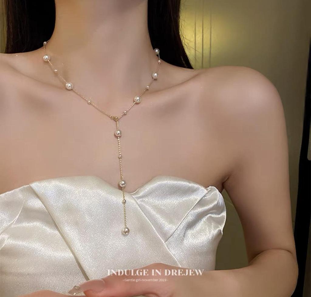 Elegancki naszyjnik z kokardą z pereł: Luksusowy łańcuszek obojczykowy ze stopu z niszowym wzorem