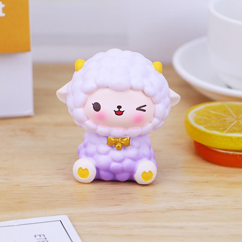 

Adorable Sheep Resin Figurine: Desktop Ornament & Cake Decoration As shown