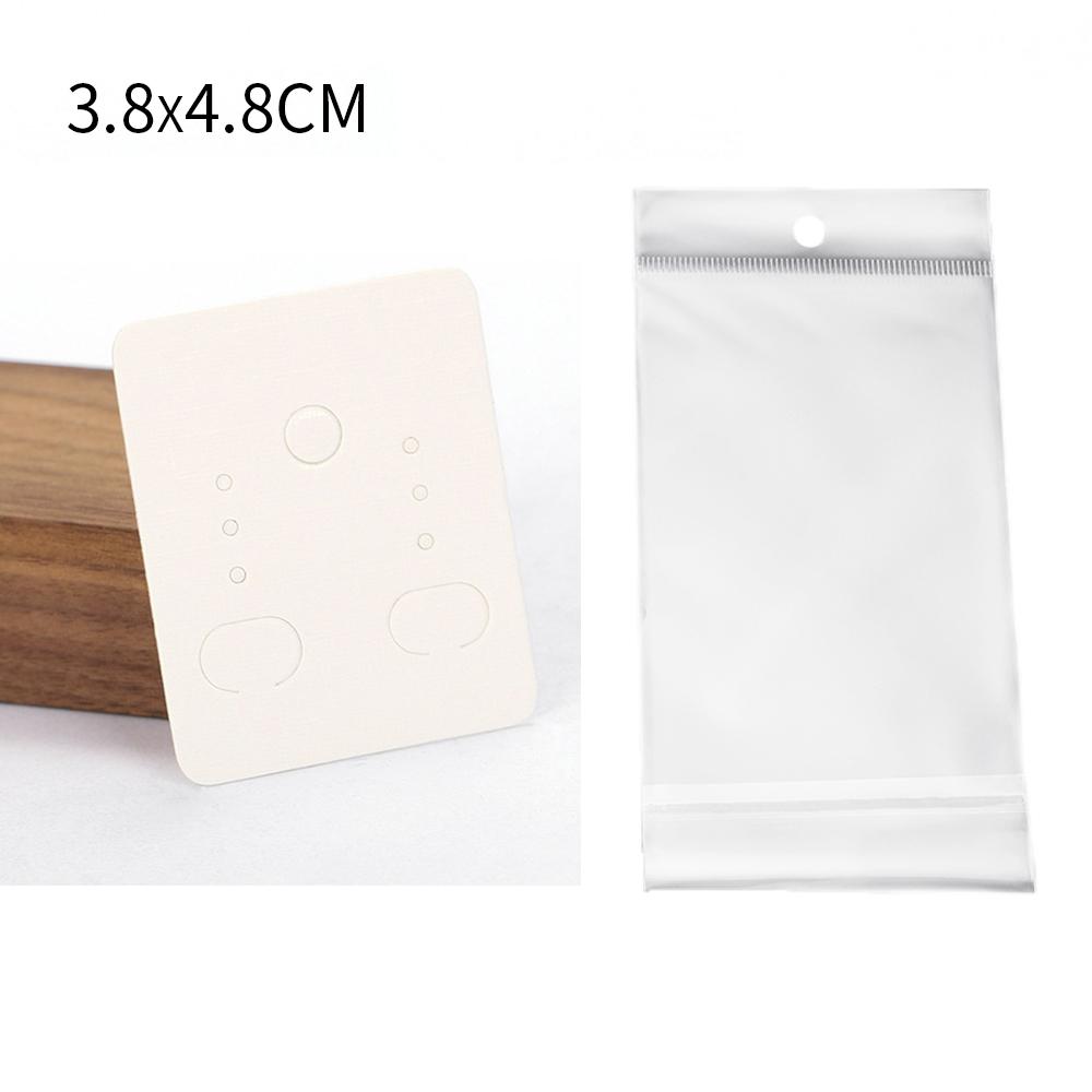 50 Jeux de Cartes pour Boucles d'Oreilles et 50 Pièces de Sacs Cartes d'Exposition pour Colliers Boucles d'Oreilles Sacs Auto-adhésifs Carte en Papier Kraft pour Emballage de Bijoux DIY