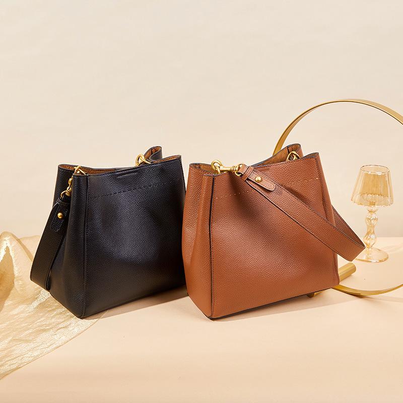 Spring/Summer 2025 Women's Genuine Leather Bucket Bag - Large Capacity, Versatile Shoulder & Messenger Style.