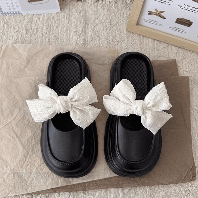 Retro high-end thick-soled 2025 new EVA bag head bow hole shoes women's summer non-slip outer sandals