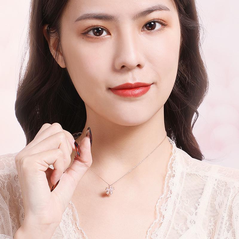 Sakura Flower Pendant Necklace: Women's Sweet Retro Zircon Clavicle Chain - Elegant & Stylish.