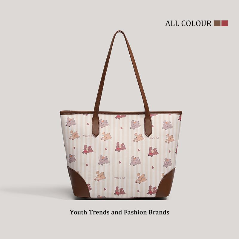 

Popular this year 2025 new summer cute printed puppy tote bag women s large-capacity commuter shoulder armpit bag