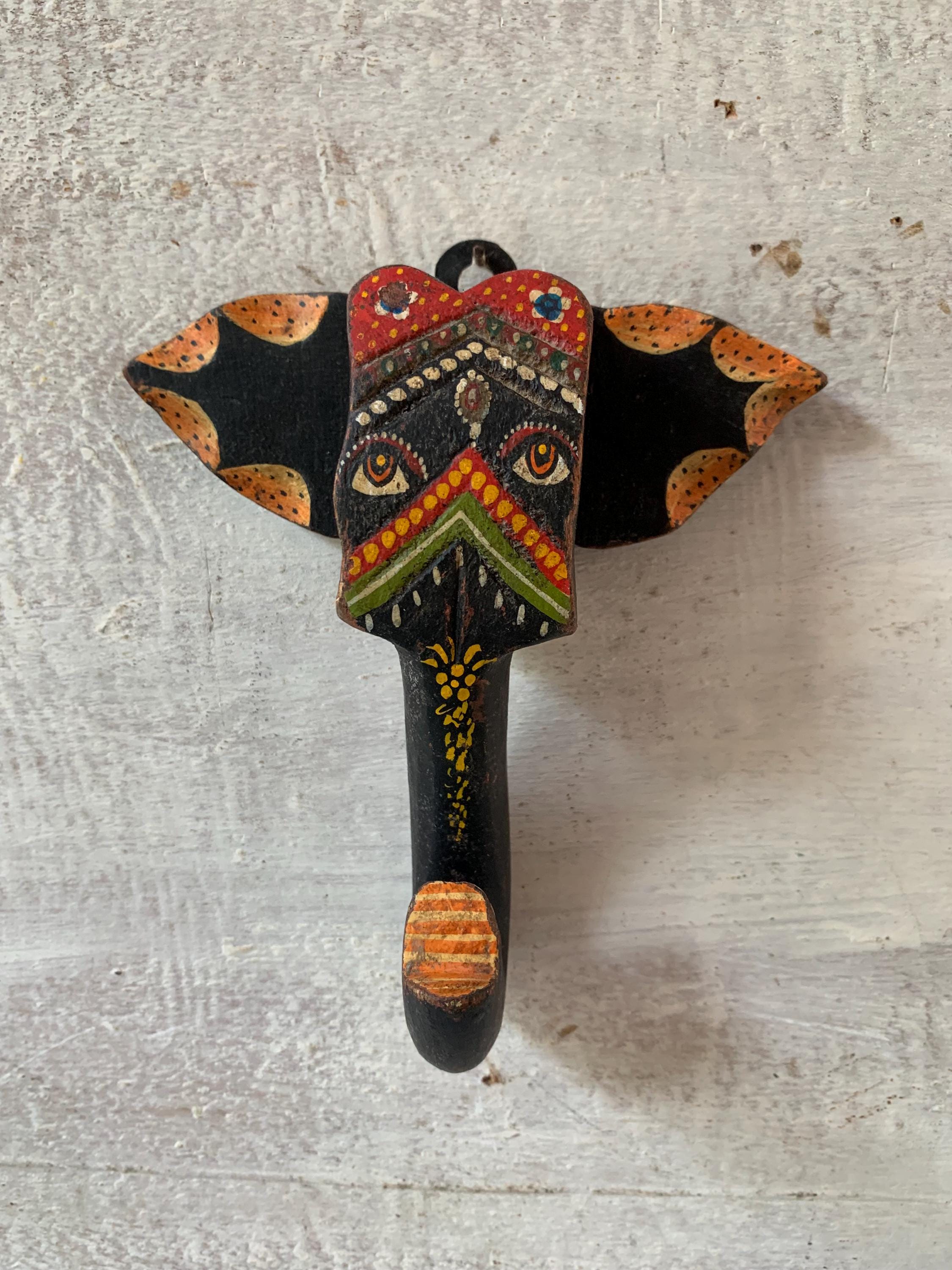 

Маска ручной работы в виде головы слона из разноцветного дерева: Экзотический настенный декор 24” X 12” X 30” (l x w x h) разноцветный