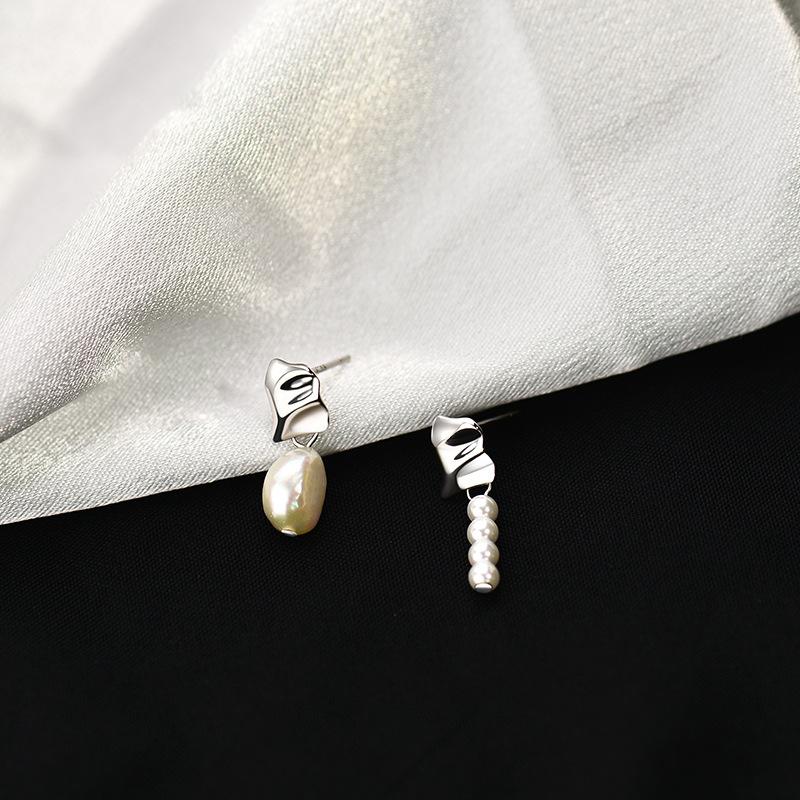 

Серьги с жемчугом Легкие роскошные серьги высокого класса Темпераментные серьги Нестандартные серьги Новый тренд