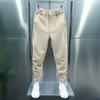 Pantalones informales para hombre, cintura elástica, botones, bragueta, pantalones largos, bolsillos, cierre de Color sólido, puños de cinta, pantalones de estilo deportivo de tenis