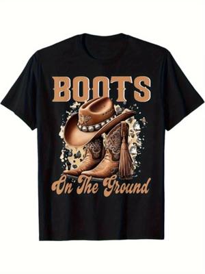 Western Cowboy Stiefel & Hut Grafik T-Shirt mit "Boots On The Ground" Slogan