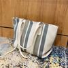 Simple commuting versatile large capacity canvas bag with high aesthetic value single shoulder cloth bag