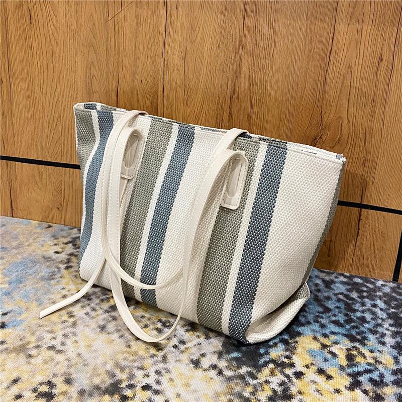 Simple commuting versatile large capacity canvas bag with high aesthetic value single shoulder cloth bag