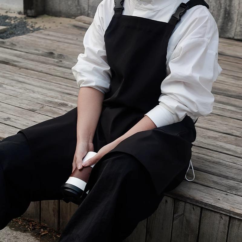 Kuchyňský catering Vodotěsná pracovní zástěra s kapsami a přední dělenou pánskou Dámské pracovní oděvy proti chlupům pro kavárnu Pet Salon