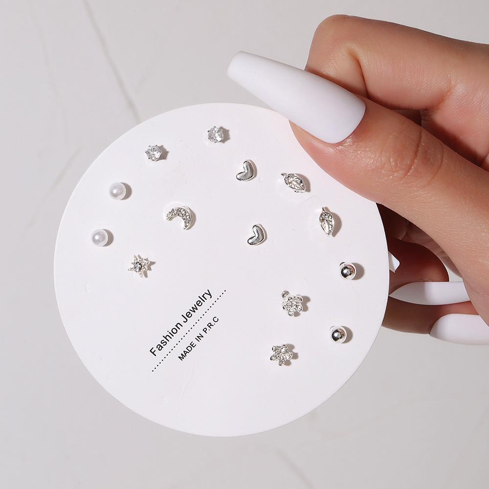 Korean version of small stud earrings, exquisite 1 pair of stud earrings a week, simple color dripping small earrings, love zircon stud earrings.