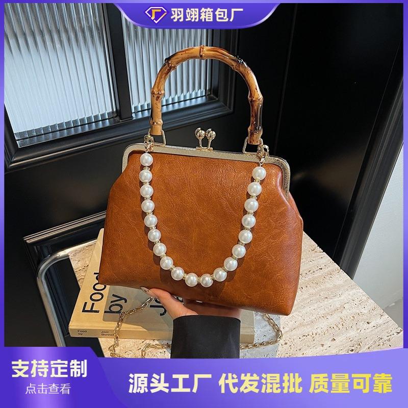 Spring and summer retro small bag women's new fashion bamboo joint portable mouth gold bag pearl chain messenger bag