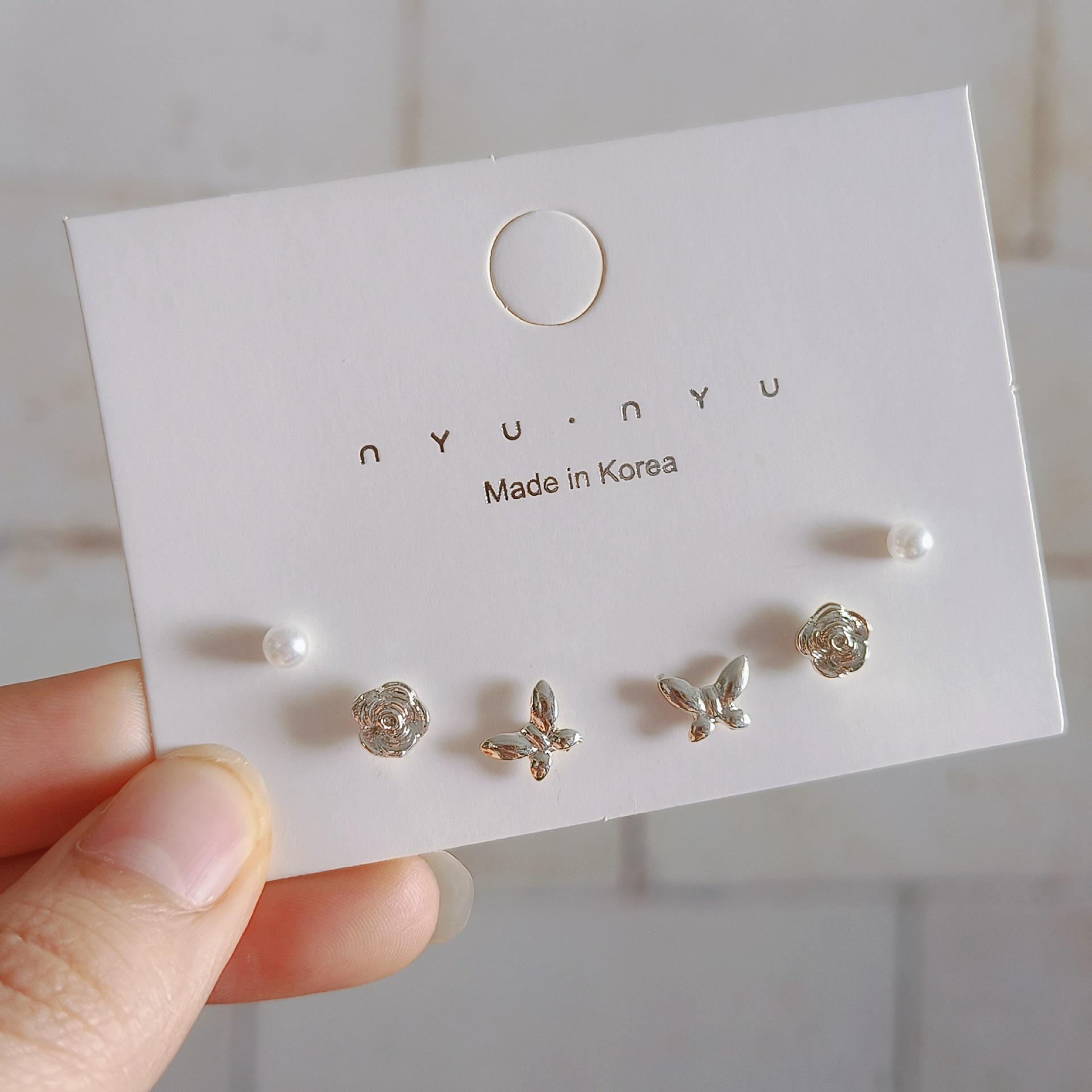 Exquisite and compact butterfly flower geometric suit stud earrings ins trendy temperament simple daily commute