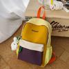 Schoolbag1011 new contrasting color splicing backpack, male and female students small schoolbag, outdoor travel high value leisure backpack