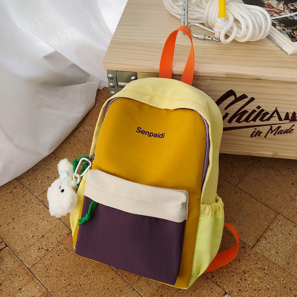 Schoolbag1011 new contrasting color splicing backpack, male and female students small schoolbag, outdoor travel high value leisure backpack