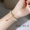 Brățară cu perle de apă dulce Meier - design vintage cu mărgele placate cu cupru roz și pandantiv floare de trandafir