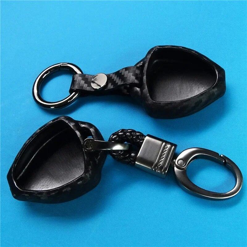 Husa pentru chei de masina din silicon din fibra de carbon pentru Toyota Auris HiLux Corolla Fortuner Prado Verso Camry Yaris Vitz Vios Ractis