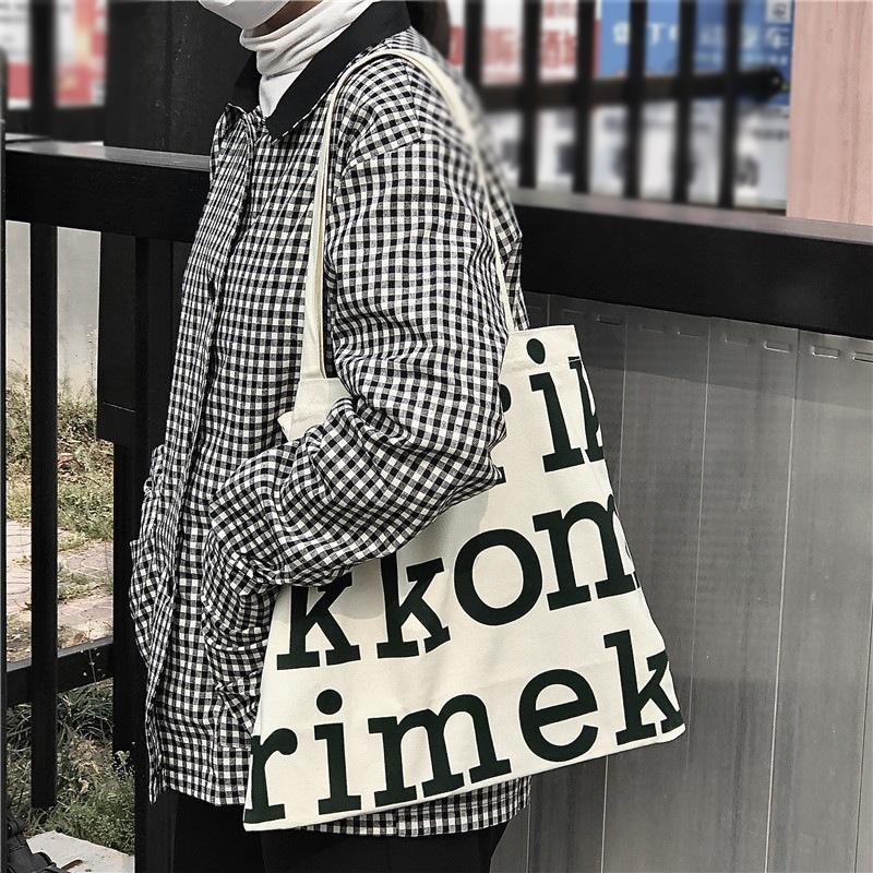 

Lazy Style Daily Large Letter Canvas Women S Bag Personalized Travel Large Capacity Single Shoulder чёрный