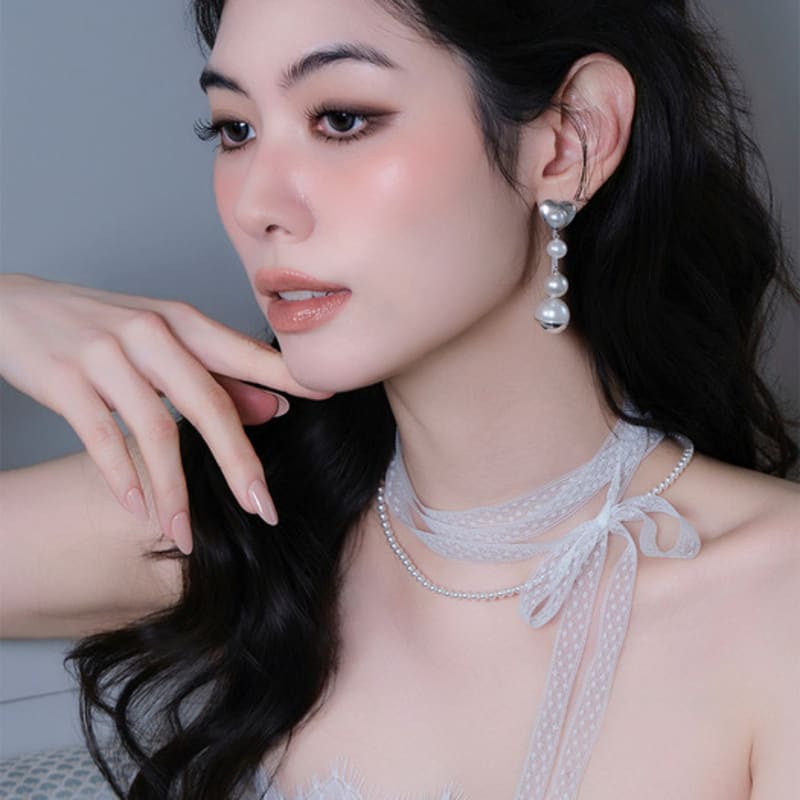 

reve love pearl drop earrings Silver