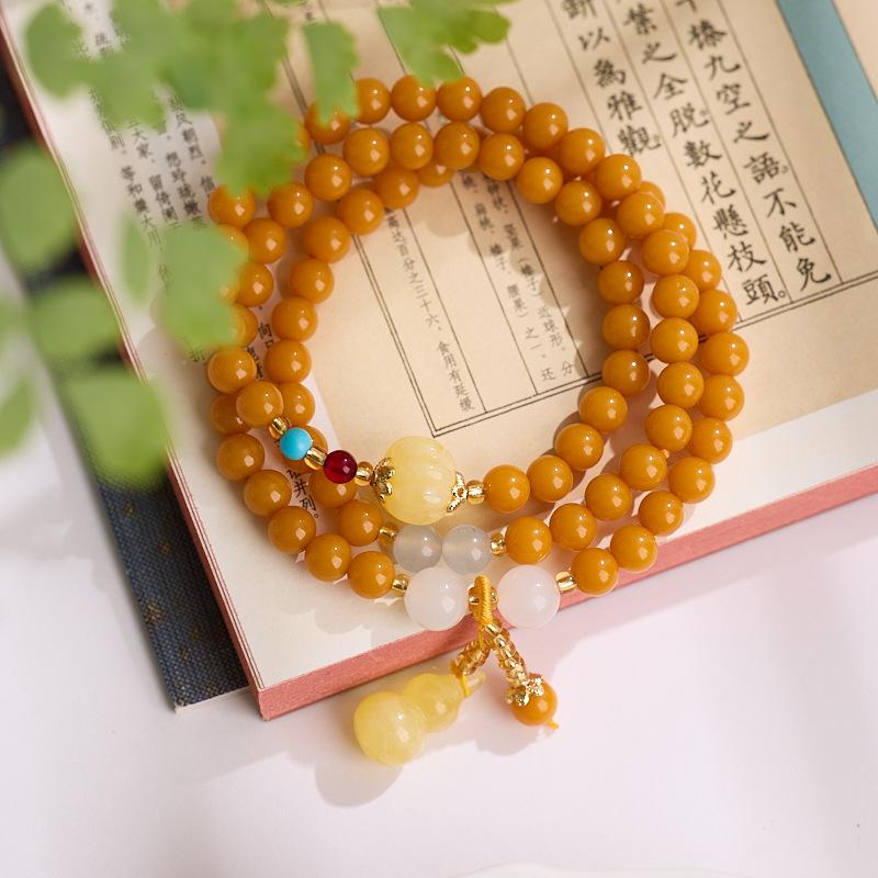 

Second-generation amber bracelet for men and women12MM Chicken Oil Yellow Beeswax Gourd Ornament Light Luxury Niche Exquisite Fortune Bracelet 【Second-generation ambe