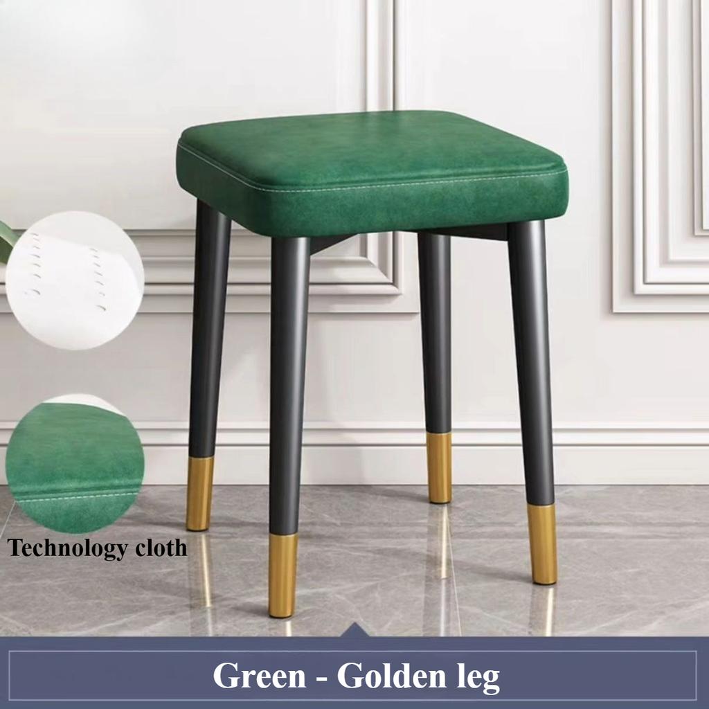 Tabouret rembourré moderne pour salle à manger, salon, chambre à coucher et bureau | avec repose-pieds doré, structure de pieds croisée