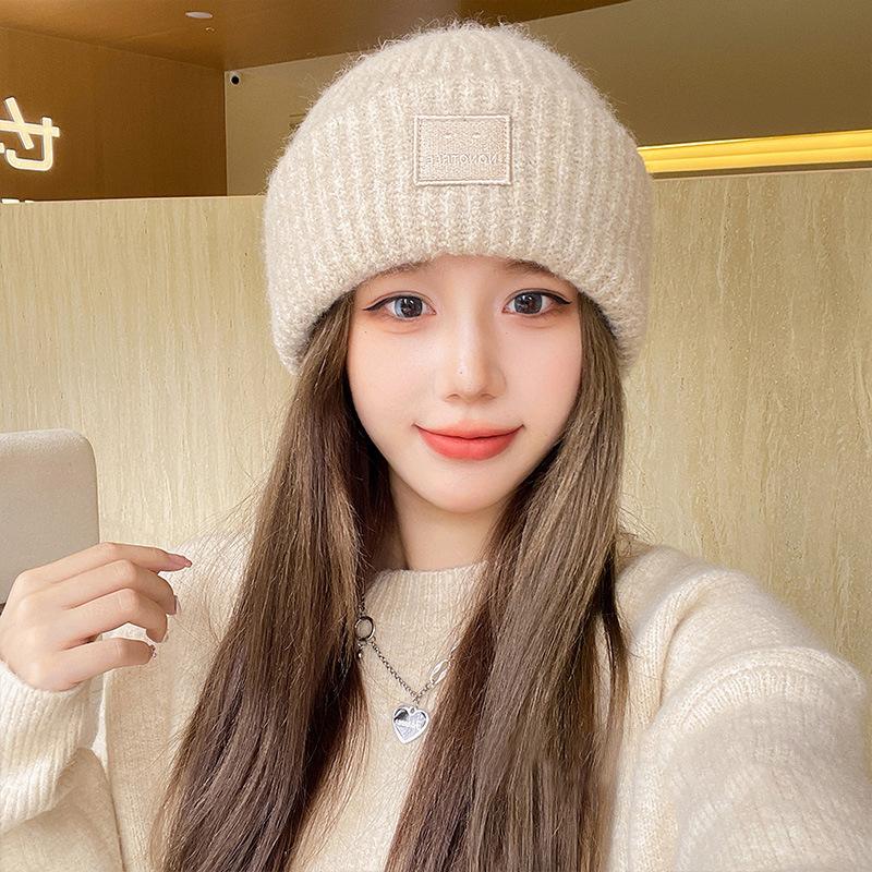 Autumn and winter wool hat women's loose sticker big head circumference beige cold hat warm and thickened new ear protection knitted hat