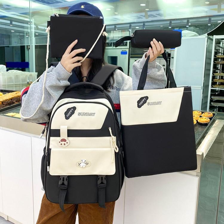 Junior high school backpack women's large-capacity four-piece set middle school student backpack high-value college student schoolbag