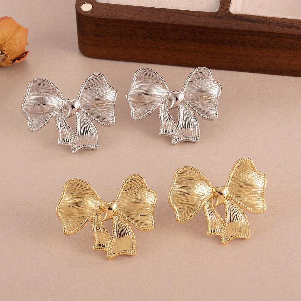 Retro Bow Stud Earrings Design Sense Personality Versatile Smooth Surface High Sense Earrings New Earrings