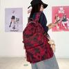 Schoolbag schoolbag female burden reduction large-capacity backpack male can hang tie rod college student travel commuter backpack tie-dye bag