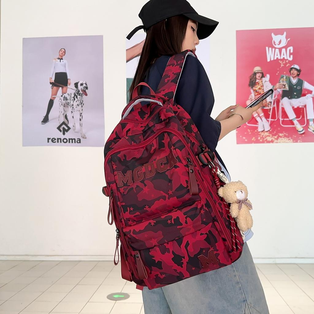 Schoolbag schoolbag female burden reduction large-capacity backpack male can hang tie rod college student travel commuter backpack tie-dye bag