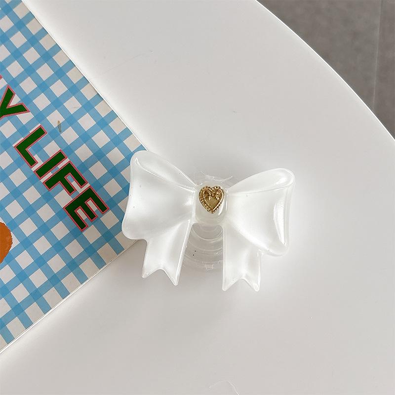 

Simple Style Desktop Watching Drama Mobile Phone Airbag Bracket Solid Color Bow Paste Creative Stable Support Frame