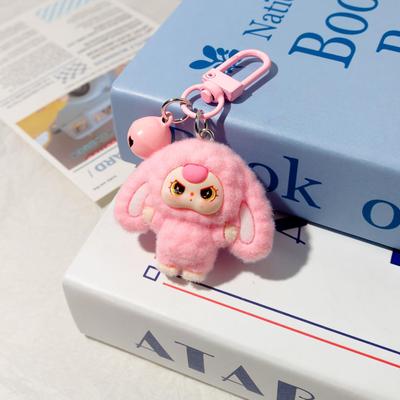 Dreijährige Zeichentrickpuppen-Schlüsselanhänger mit Beflockung, großen Ohren und 3D-Design für Schüler-Schulranzen.