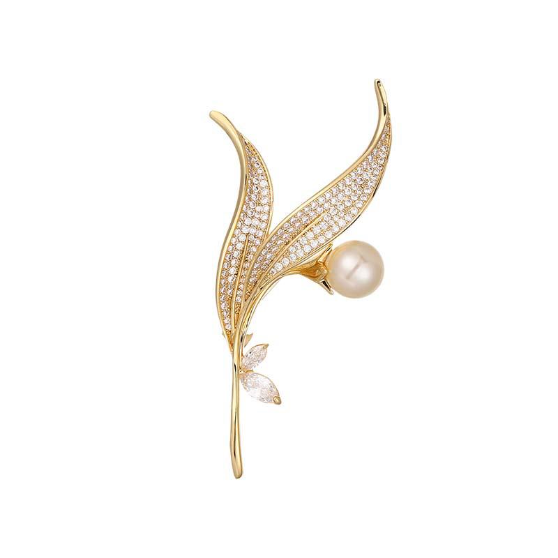 Elegancka broszka w kształcie liścia z cyrkoniami i perłami - Luksus i wyrafinowany design