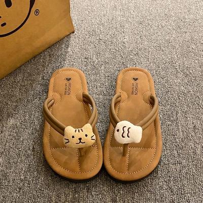Vêtements d'extérieur décontractés et polyvalents, pantoufles plates cool, sens du design de niche, tongs de dessin animé mignonnes pour femmes, nouveaux modèles été et automne 2025