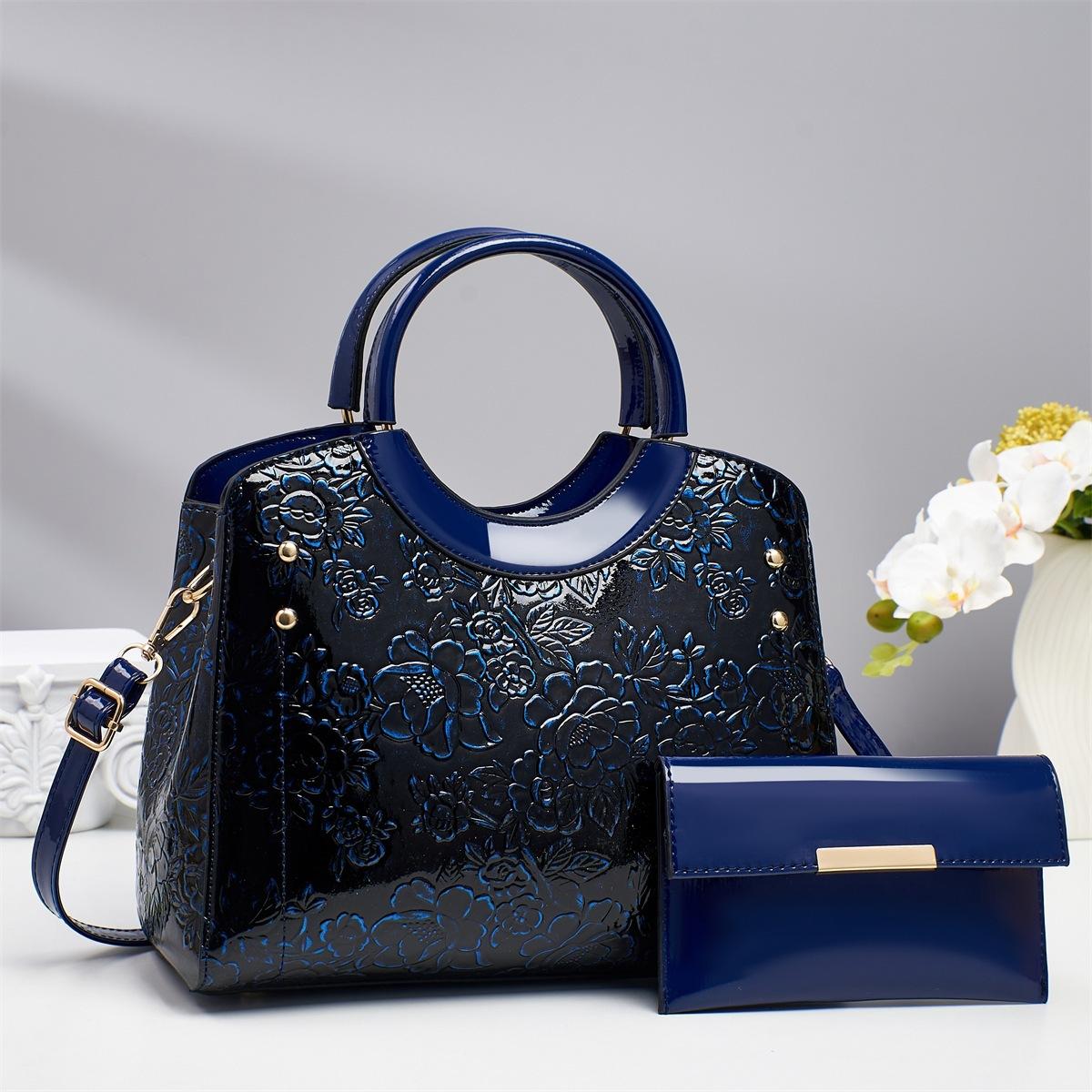 

Fashion women s bags trendy brand European and American high-end sense child and mother handbags popular atmosphere portable commuter women s bags Length 28 width 13 height 23 синій