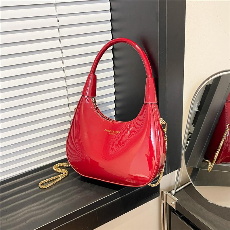 

2025 весна новая популярная ангола бордовая лакированная кожа высококачественная текстура женская сумка U-образная сумка-пельмень красный