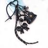 Exquisite Woven Maillard Bow Rope Pendant Earphone Gifts Mini Bow Faux Leather Bag Accessories for Women