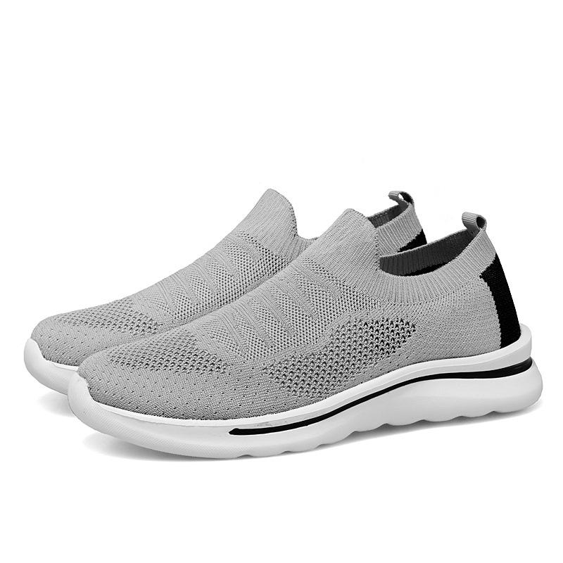 Spring and summer mesh foot health flying weaving breathable walking shoes casual soft sole casual shoes couple shoes