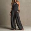 Europäische und amerikanische Damenkleidung, schulterfreier Jumpsuit mit Neckholder und Cut-outs, gestrickter vertikal gestreifter weiter Jumpsuit