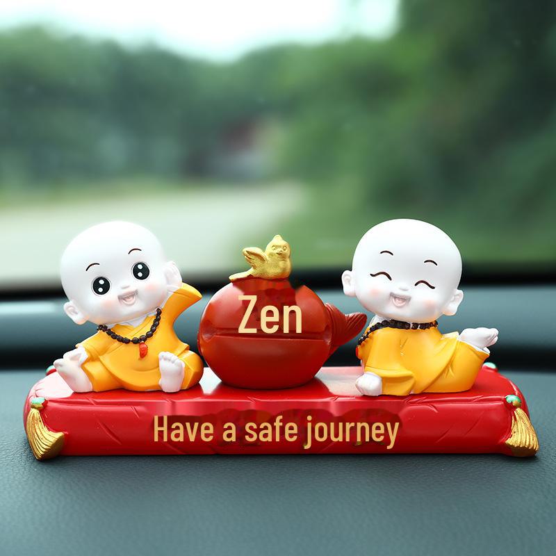 Creative Little Monk Maitreya Buddha Car Ornament: Cute, Shaking Head Resin Doll for Car Interior Decoration and Safety.
