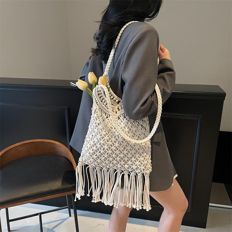 Bohemian Tassel Hollow Woven Bag Women's New Large-capacity Seaside Vacation Wind Tote Bag