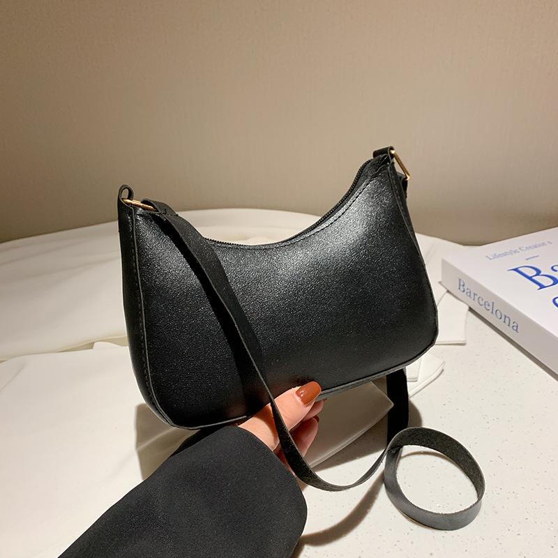 Eine modische DAMEN Tasche Unterarmtasche