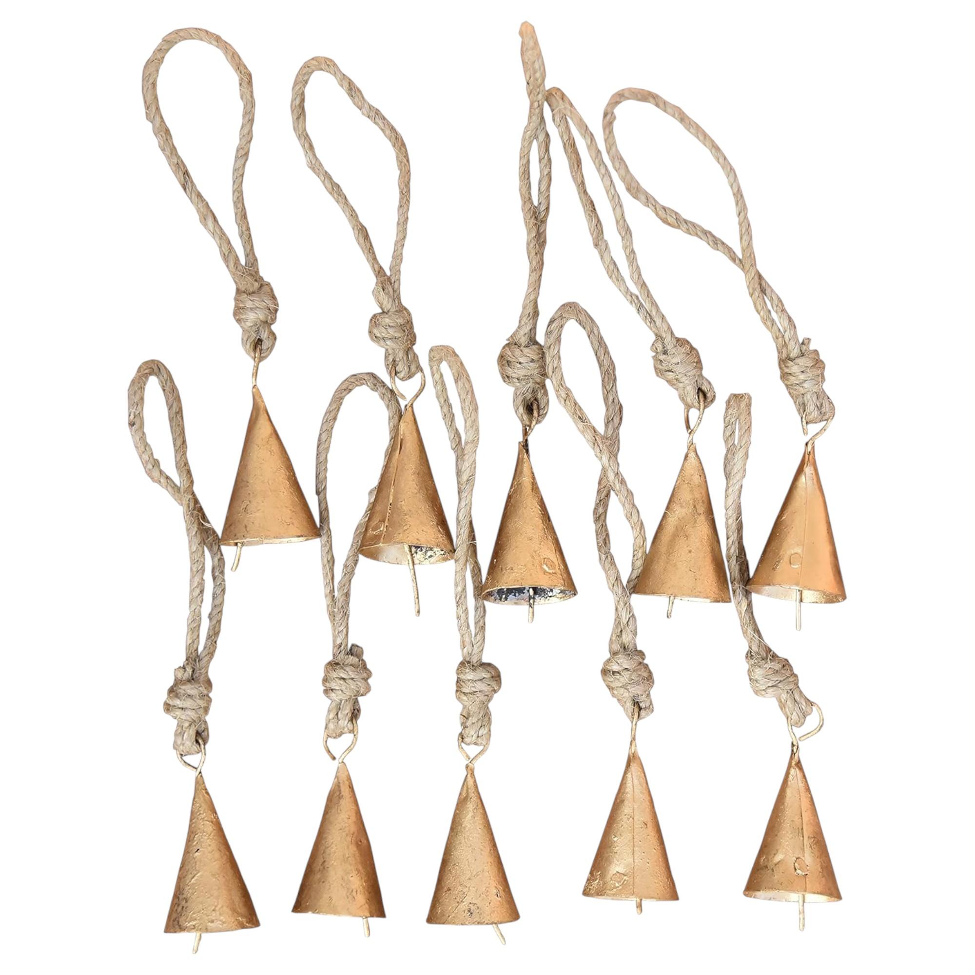 

10-Pack Rustic Gold Metal Cow Bells with Jute Rope, 2-Inch Vintage Cone Bells for Crafts, Witch Bells, and Boho Farmhouse Wall Decor
