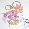New Sparkling Sequin Initial Keychain with Butterfly Tassel & Crystal Accents