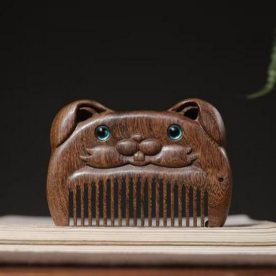 Portable Black Gold Sandalwood Zodiac Mini Comb with Blue-Eyed Carved Flower Design