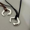 Brown Leather Cord Necklace with Silver Abstract Human Body Pendant – Autumn/Winter Light Luxury Clavicle Chain