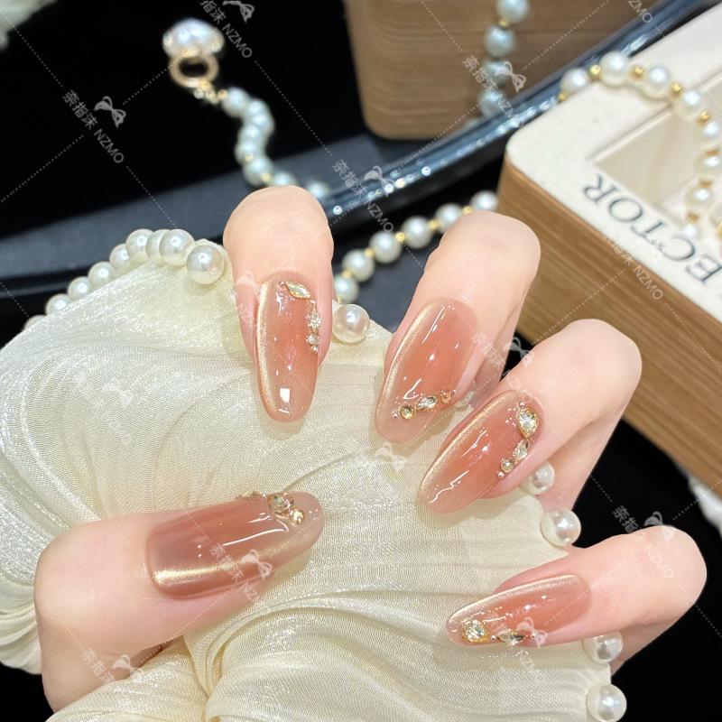 

Y83 Luxurious Champagne Diamond Cat Eye Nails with Super Flash Gold Powder Mist M【For slightly larger hands】